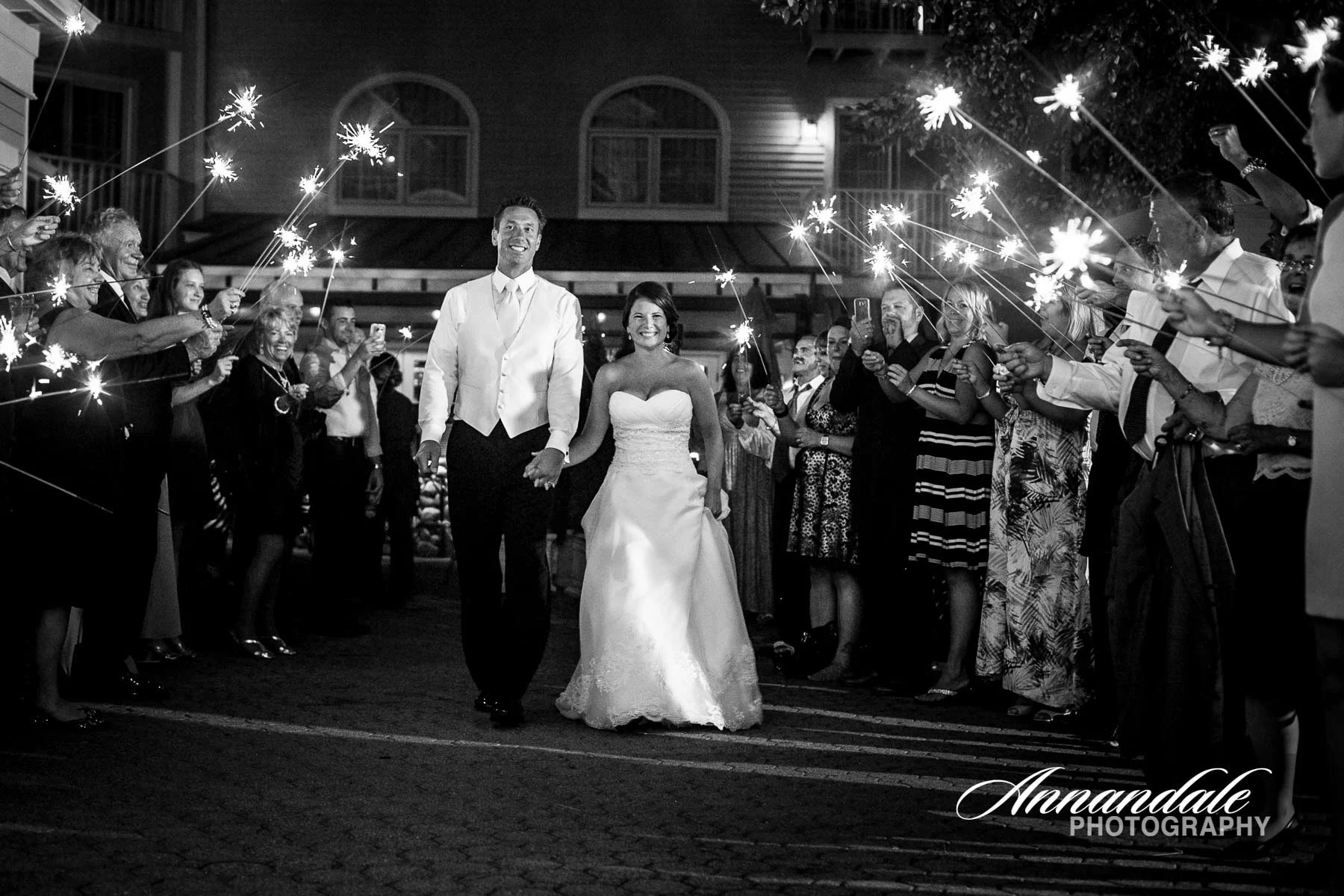 Bride and groom walking out of wedding.