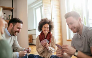 Photo of Friends Playing Games in Hotel